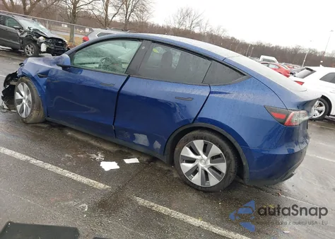 2023 Tesla Model Y Awd/Long Range Dual Motor All-Wheel Drive z USA, uszkodzony, nr VIN 7SAYGAEE3PF666552